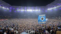Wild stadium invasion and police clash leaves 25 fans seriously injured