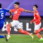 Guangzhou Evergrande's Wei Shihao (C) scored four goals in the first three games of the season