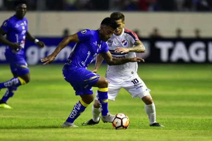 Midfielder Sergio Lopez (left), playing for previous club Delfin