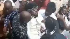 Beenie Man faints at Mother's funeral