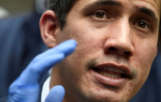 The United States is voicing hope that international support will remain for Venezuelan opposition leader and self-proclaimed acting president Juan Guaido, seen here delivering a press conference in June 2020 in Caracas