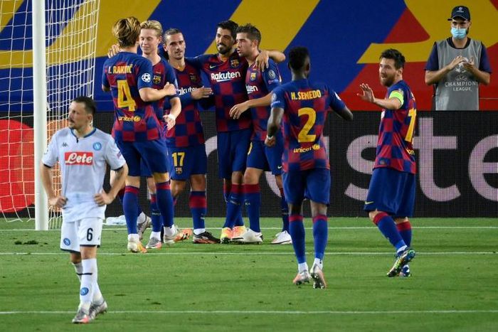 Barcelona beat Napoli to reach the Champions League quarter-finals