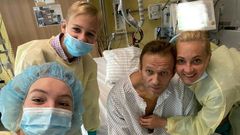 fell ill on a flight from the Siberian city of Tomsk to Moscow after a trip to support opposition candidates in local elections