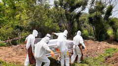 Coronavirus burial team says it’s overwhelmed with dead bodies