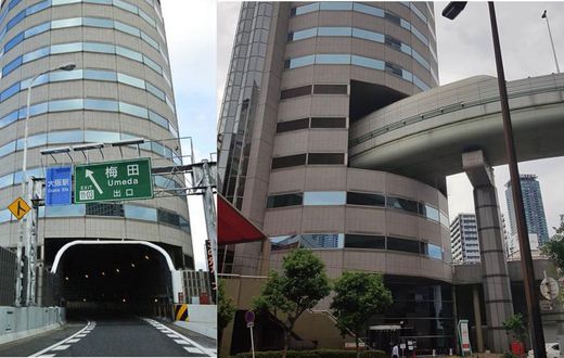 This Japanese building has a highway passing right through it