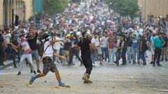 Protesters demand an end to an entrenched political system dominated by sectarian interests and family dynasties