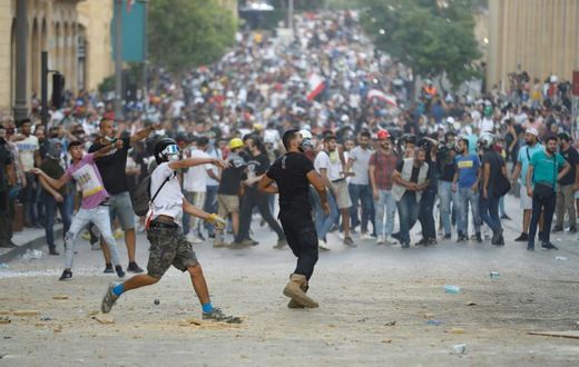Protesters demand an end to an entrenched political system dominated by sectarian interests and family dynasties