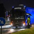 The bus transporting Juventus' players arrives at the Allianz Stadium.