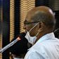 Sudan's ousted president Omar al-Bashir answers procedural questions during his trial in Khartoum