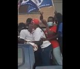 NPP supporters in police car