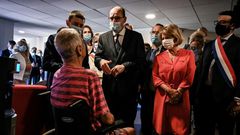 French Prime Minister Jean Castex, centre, warned of heat risks while visiting a retirement home