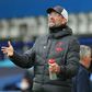 Jurgen Klopp gestures on the touchline during Liverpool's match against Everton