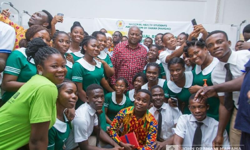 John Mahama with health workers