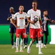 RB Leipzig's Danish striker Yussuf Poulsen (C) shows his disappointment at their Champions League defeat to Paris Saint Germain in the semi-finals on Tuesday.
