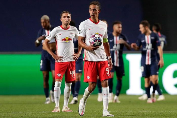 RB Leipzig's Danish striker Yussuf Poulsen (C) shows his disappointment at their Champions League defeat to Paris Saint Germain in the semi-finals on Tuesday.