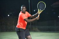 Asamoah Gyan on the tennis court