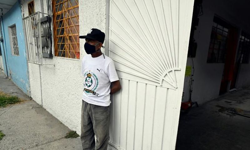Andres Hernandez became homeless after losing his job in a printing workshop and now lives in a room paid for by a homeless charity