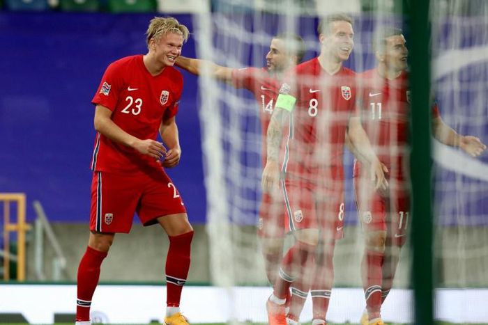 Norway's forward Erling Braut Haaland (L) celebrates scoring their second goal during the UEFA Nations League football match between Northern Ireland and Norway at Windsor Park in Belfast on September 7, 2020.