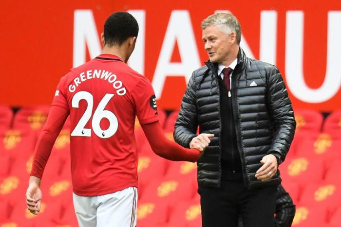 Manchester United manager Ole Gunnar Solskjaer (right) and forward Mason Greenwood
