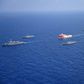 The Turkish Oruc Reis research ship, accompanied by a small navy fleet, sails into disputed Mediterranean waters
