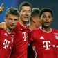 Serge Gnabry (R) celebrates with Thomas Mueller and Robert Lewandowski after scoring for Bayern Munich in their 3-0 Champions League semi-final victory over Lyon in Lisbon