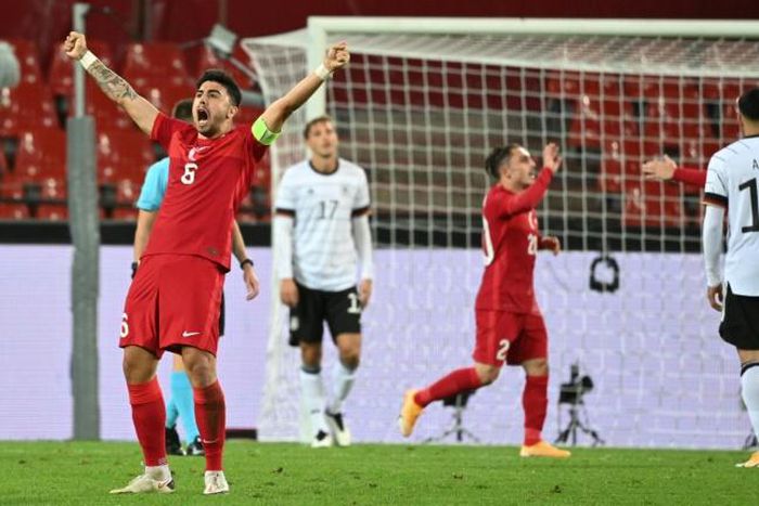 Turkey's Ozan Tufan celebrates Kenan Karaman's equaliser