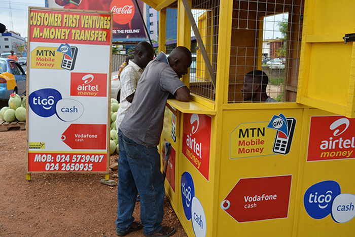Ghanaians are using mobile money to remit funds more than cheques, report says