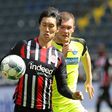 Eintracht Frankfurt's Japan forward Daichi Kamada (L) has extended his contract with the Bundesliga side until 2023