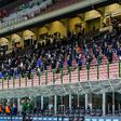 Socially distanced spectators attend the Serie A match between Inter Milan and Fiorentina in the San Siro