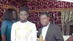 Kuami Eugene presents 2020 VGMA plaques to his pastor