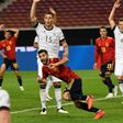 Spain defender Jose Luis Gaya (C) claims a last-gasp equaliser against Germany in Stuttgart on Thursday.