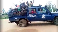 Western Togoland members with police car