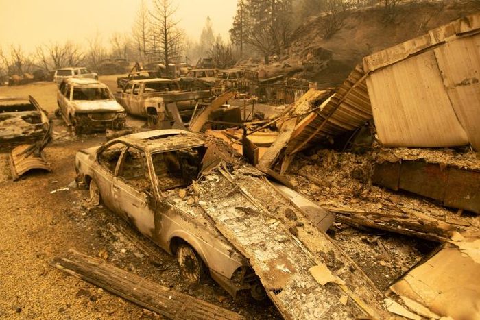 Vehicles torched in central California's Creek Fire smolder in an unincorporated area of Fresno County