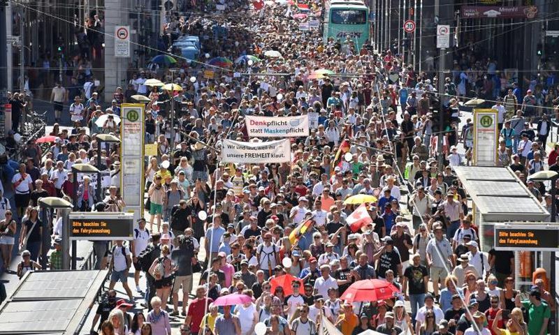 Demonstrators, some of whom have branded the pandemic a conspiracy, demanded a "day of freedom" in protest against virus curbs