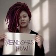 Nadia Buari holds "End SARS" placard