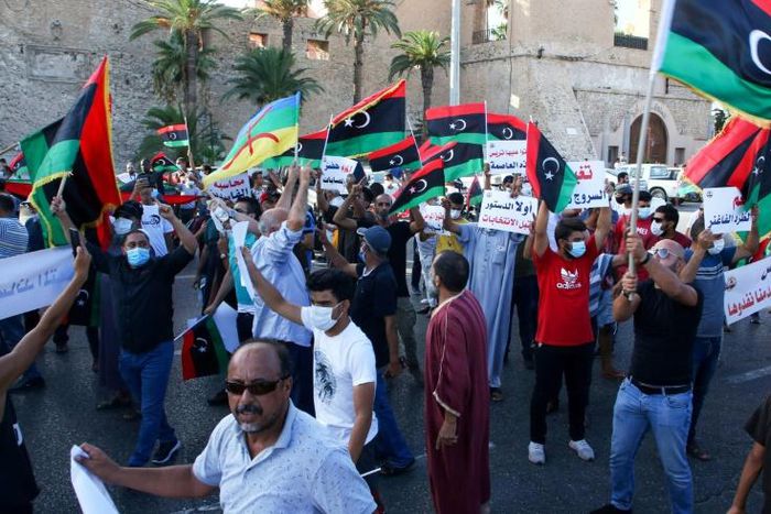 Libyans protested for a third consecutive day on Tuesday against poor public services in the capital Tripoli, before a unity government ordered a lockdown on Wednesday