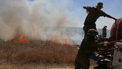 Blazes sparked by fire bombs floated across the Gaza border on balloons have caused damage to crops in southern Israel