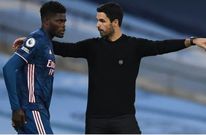 Thomas Partey and his coach Mikel Arteta