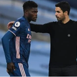 Thomas Partey and his coach Mikel Arteta