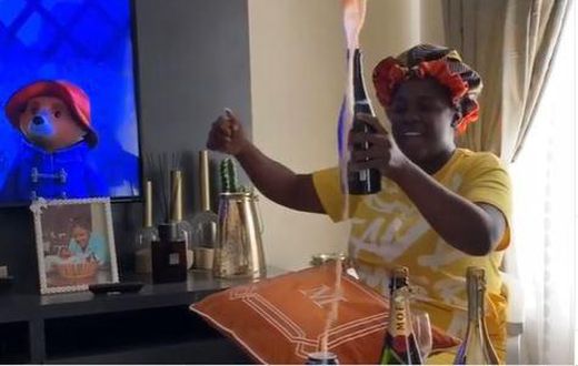 Tracey Boakye pops champagne