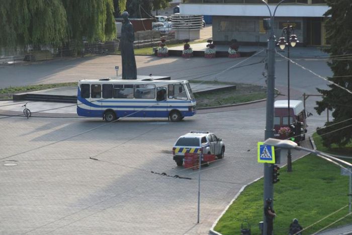 The SBU security service said all 13 hostages were released unharmed after a police stand-off with the man