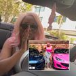 Stonebwoy and DJ Cuppy in her new Ferrari