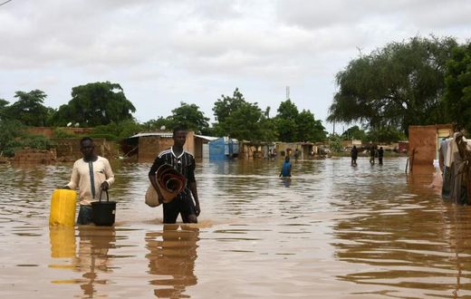 Dozens of residents in the capital Niamey fled their homes earlier on Thursday, wading or swimming through flooded streets