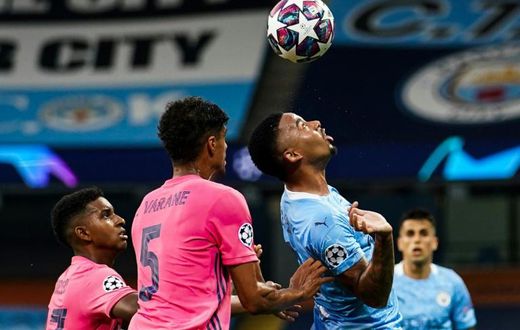 Gabriel Jesus made the most of two shocking mistakes by Raphael Varane, scoring one goal and creating another as Manchester City beat Real Madrid 2-1 to reach the Champions League quarter-finals 4-2 on aggregate on Friday