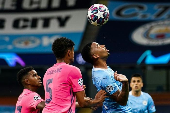 Gabriel Jesus made the most of two shocking mistakes by Raphael Varane, scoring one goal and creating another as Manchester City beat Real Madrid 2-1 to reach the Champions League quarter-finals 4-2 on aggregate on Friday