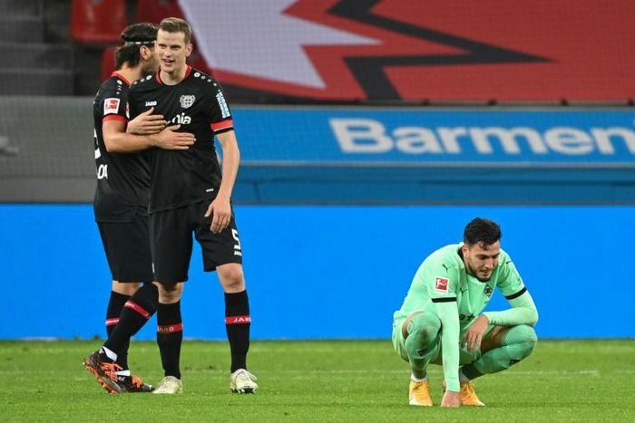 Algerian Ramy Bensebaini (R) shows his disappointment after Borussia Moenchengladbach lost to Bayer Leverkusen