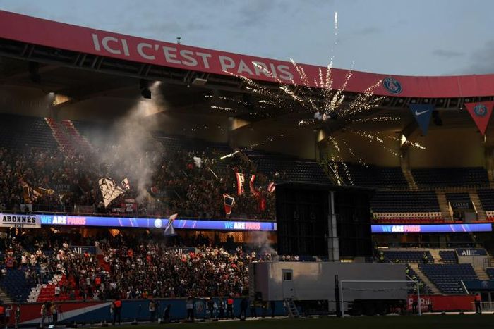 Fans gathered behind the goal to watch on a big screen