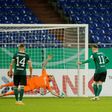 Schalke goalkeeper Ralf Fahrmann (C) saves a penalty from Schweinfurt's Amar Suljic (2ndR) in the home side's 4-1 German Cup victory over Schweinfurt