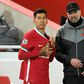 Jurgen Klopp (right) defended Roberto Firmino's (left) impact at Liverpool despite a shortage of goals from the Brazilian striker