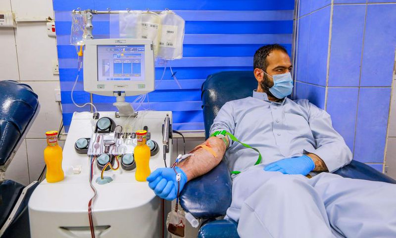 A recovered coronavirus (COVID-19) patient donates blood samples for plasma extraction to help critically ill patients at the National Blood Transfusion Center.